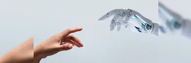 Human hand reaches for robotic hand