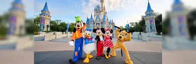 Disney characters outside Cinderella's castle