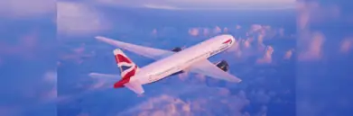 BA plane flying above clouds