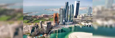 Abu Dhabi skyline with sea in background