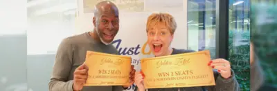 Claire Dutton, trade sales manager at the JG Travel Group, posing with a colleague and the Golden Ticket prize.