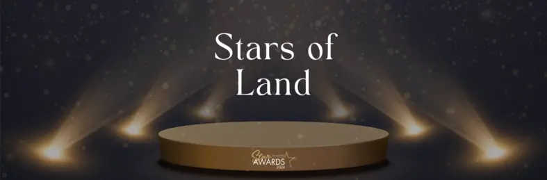 The Travel Bulletin Star Awards logo with a black and sparkly gold background.
