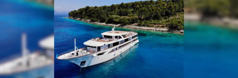 The exterior of Memories as it docks in a bay.