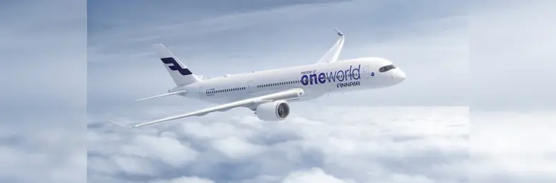 A Finnair Airbus A350 with the 'oneworld Alliance' logo emblazoned on the side in flight.