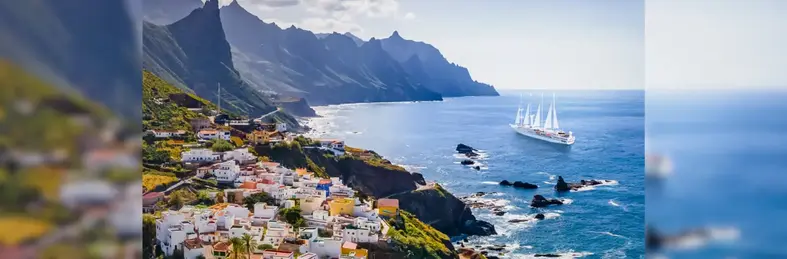 Image of Wind Star vessel sailing close to the shore of one of the Canary Islands