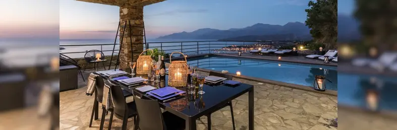 The outdoor dining area of L'Ancre Bleue, a villa in St. Florent, Corsica.