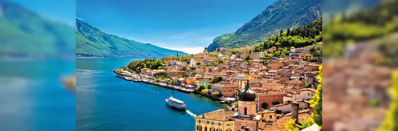 Image of the building-lined shoreline of Lake Garda