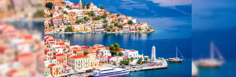 Image of a bustling harbour coastline in Greece
