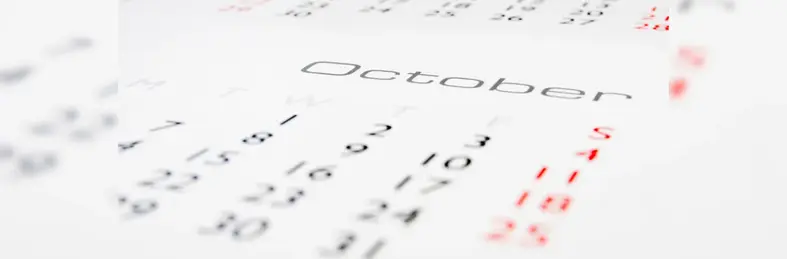 A calendar open on the October page.