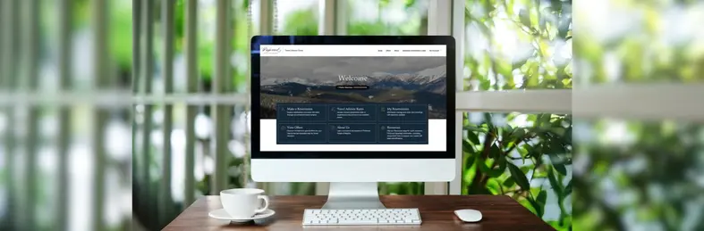A mockup of an Apple Mac desktop computer open on Preferred Hotels & Resorts' new travel agent platform.