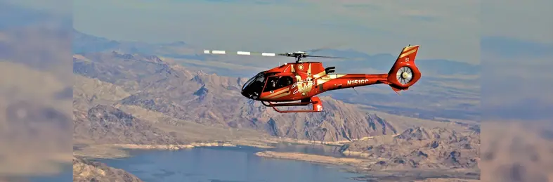 A helicopter flying over Lake Mead on a Golden Eagle Helicopter Tour from Las Vegas, Nevada.