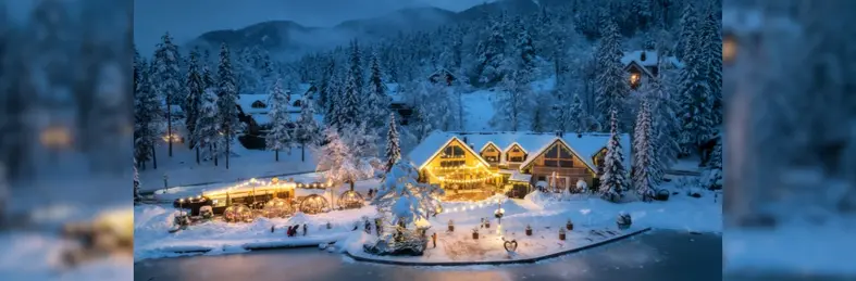 A chalet in the snow on Lake Jasna in Slovenia. 