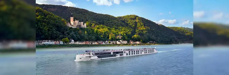 Uniworld's S.S. Elizabeth sailing past Stolzenfels Castle in Koblenz, Germany.