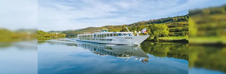Image of MS Lafayette sailing down a river