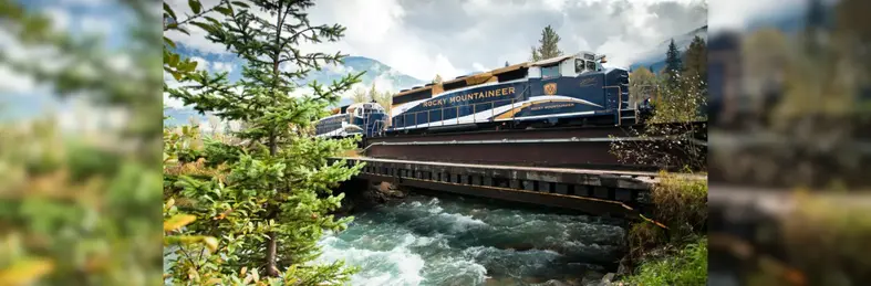 Image of the Rocky Mountaineer crossing over a river 