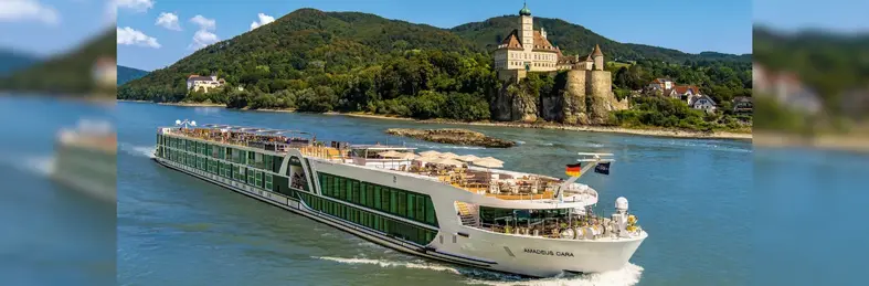 Amadeus Caa sailing past Schloss Schönbühel, a castle in the Lower Austrian town of Schönbühel-Aggsbach, below Melk on the right bank of the Danube.