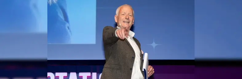Image of Andy Harmer pointing at the camera at CLIA Conference 2025