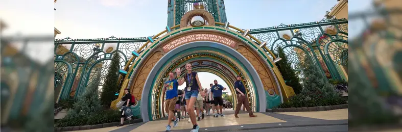 Guests walking through one of the 'portals' at Epic Universe, the new theme park at Universal Orlando Resort.