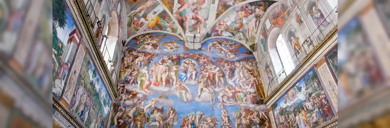 Michelangelo's painting on the walls and ceiling of the Sistine Chapel.