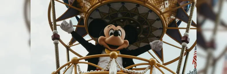 Mickey Mouse on a hot air balloon float on parade at Walt Disney World, Florida.
