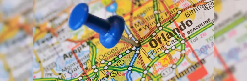 A pin in 'Orlando' on a map of Florida.