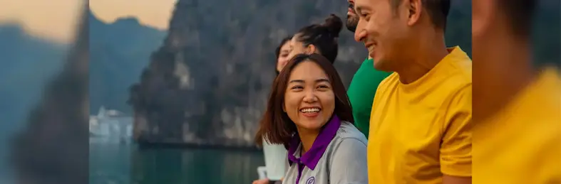 Tour group with a G Adventures specialist guide overlooking the landscape