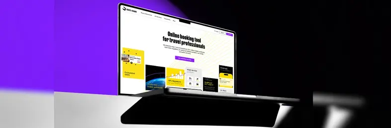 The RateHawk online platform interface on a laptop