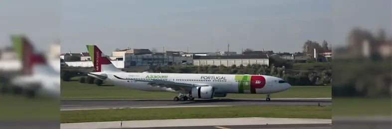 TAP Air Portugal plane on an airport runway 