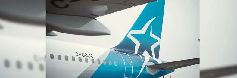The tail of an Air Transat plane.