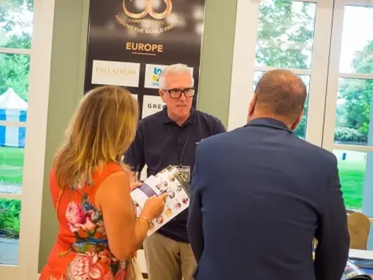 Mark Richardson, Constantinou Bros., networking at Travel Bulletin's 50th Anniversary Party.