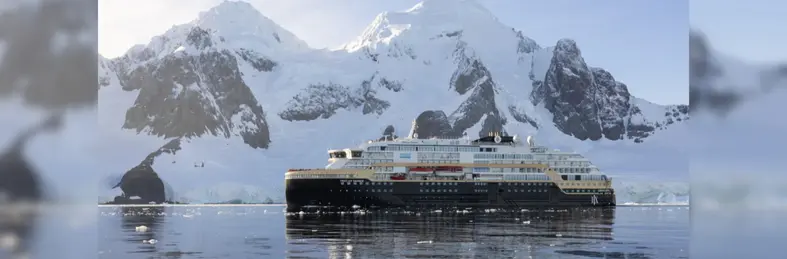 MS Fridjtof Nansen, a HX expedition vessel, sailing the Lemaire Channel in Antarctica.