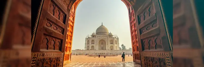 The Taj Mahal seen through an arch 
