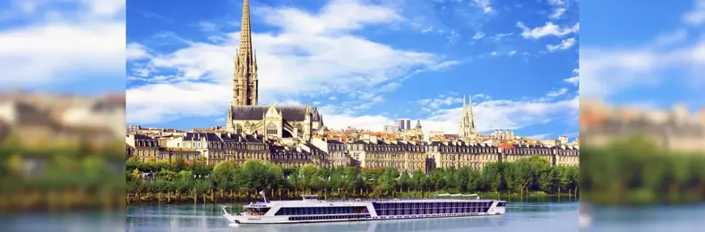 AmaDolce sailing along a river 