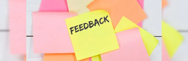 Feedback written on sticky notes on a white background