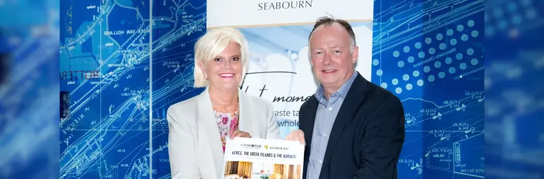 Lynn Narraway and Chris Townson celebrating the launch of Uniworld and Seabourn's new joint brochure.
