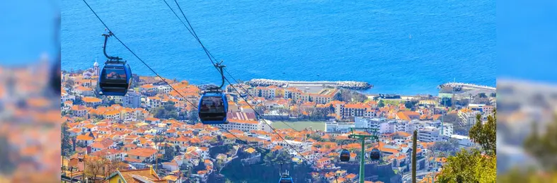 Cable cars travelling above Funchal, Madeira's capital.