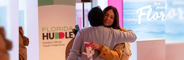 Two attendees of the Florida Huddle at Convene in London.