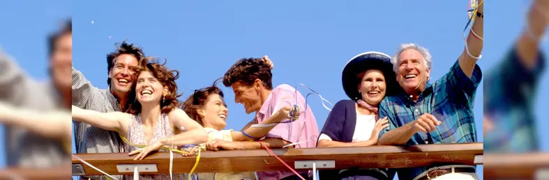 Three couples stood on the deck of a cruise ship.