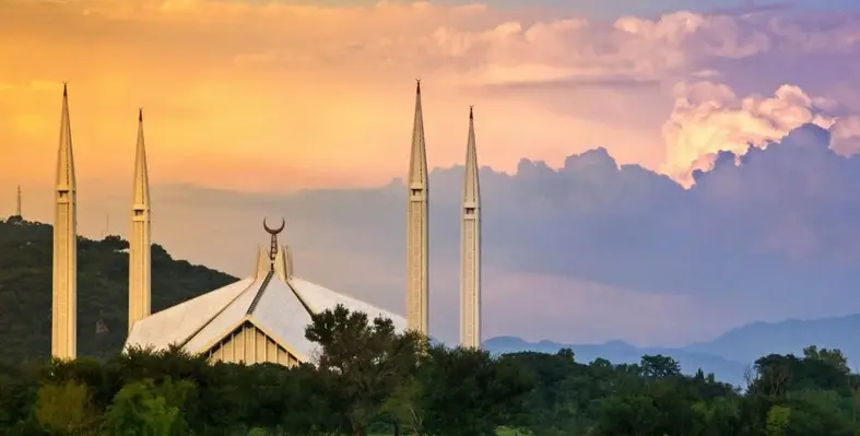 The Shah Faisal Mosque, the largest in Pakistan, at sunset.