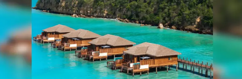 Overwater villas at a Royalton resort.