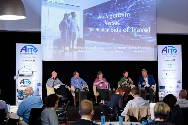 Delegates on stage at the AITO Overseas Conference 2025.