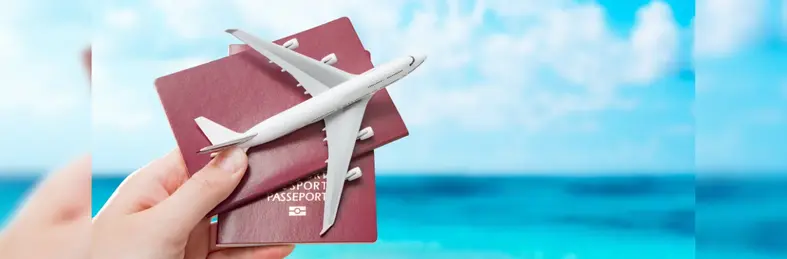 Two passports and a plane replica