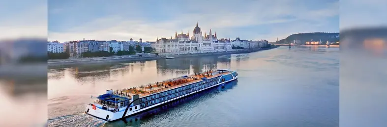 AmaMagna sailing on the Danube river past the Parliament Building in Budapest, Hungary.