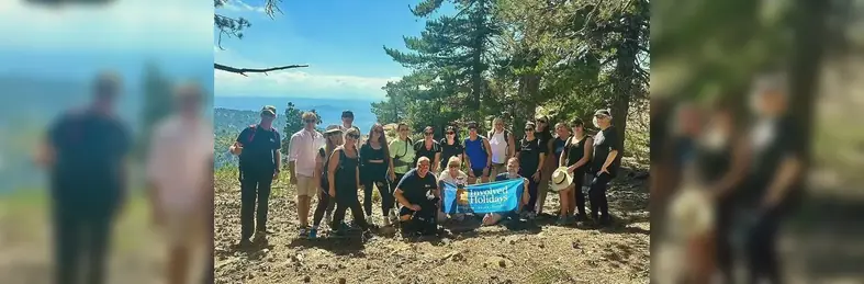 Involved Holidays Group photo hiking in forest 
