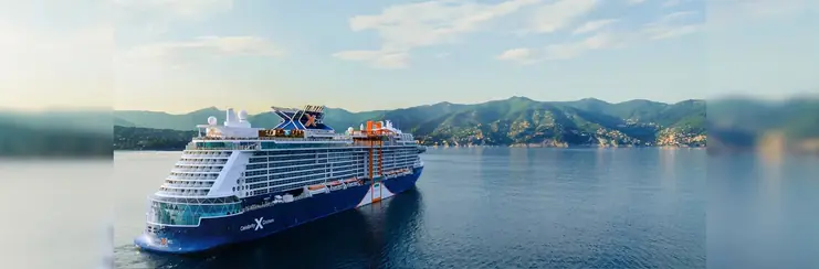 Celebrity Xcel sailing into a port