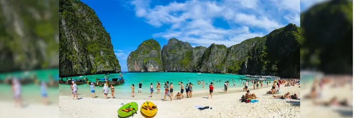 A busy beach in Phuket, Thailand