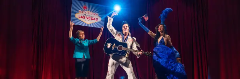 Aer Lingus crew with an Elvis impersonator and a flapper girl. 