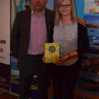 Simon Eddolls with the lucky chocolate prize winner ? Margaret Oldakowski, from Polonez Travel