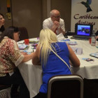 Agents take notes throughout the lively Caribbean Airlines presentation