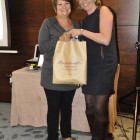 Julie Greenhill, Massachusetts (right) presents Suzanne Seed, Travel Counsellors with a Massachusetts goody bag.